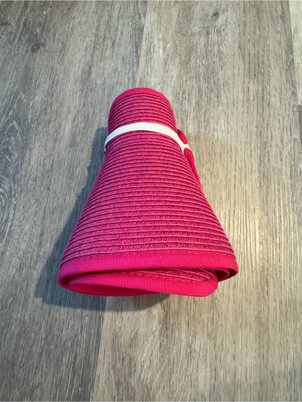NWT pink packable visor by San Diego Hat Company featuring an adjustable strap